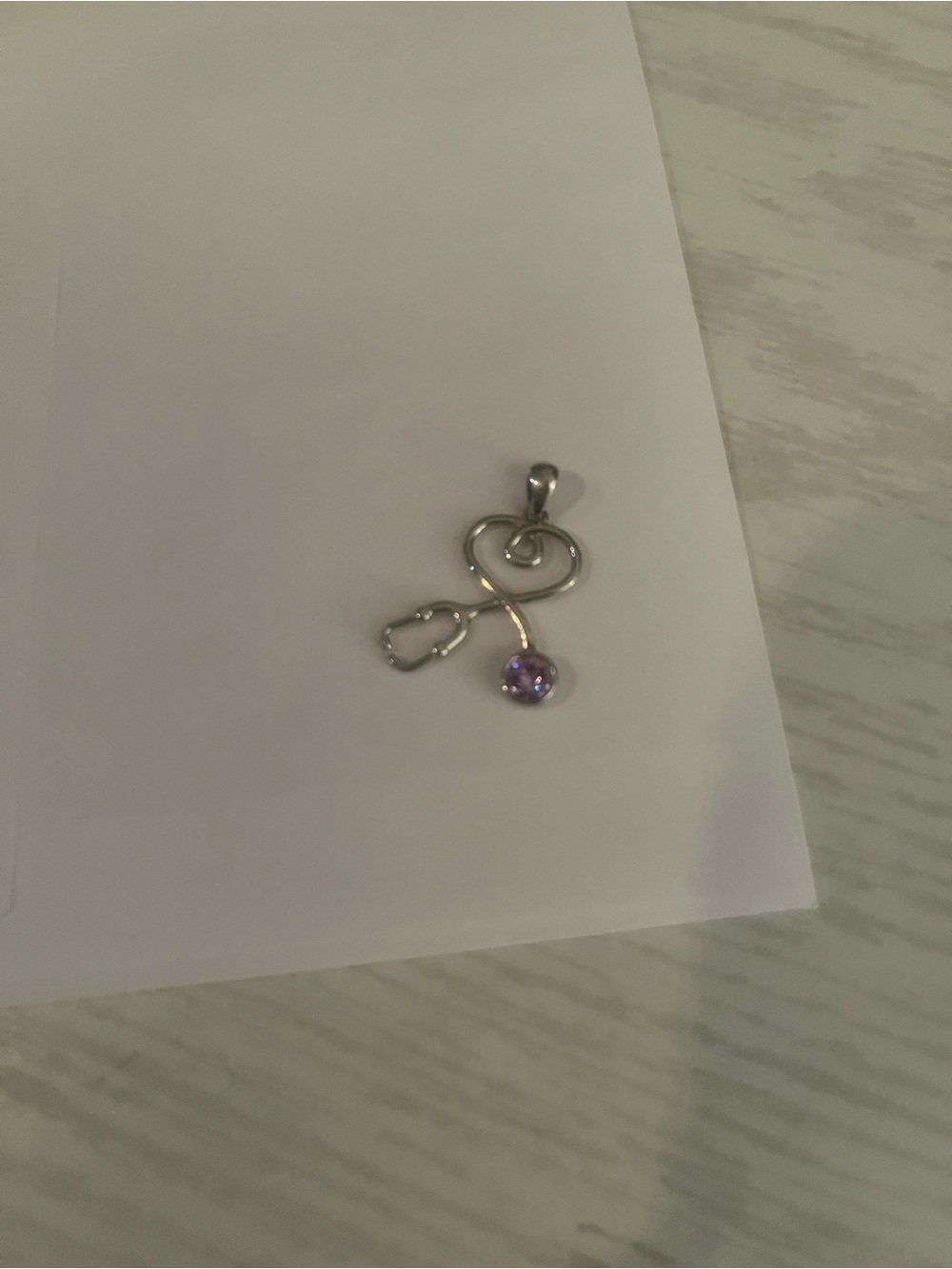 Sterling Silver Pendant with Purple Gemstone